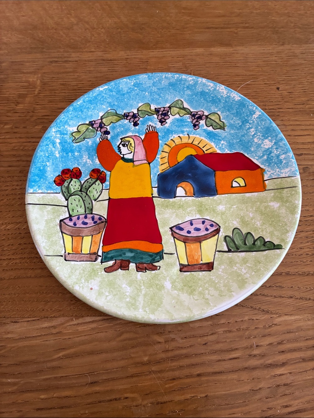 Nino Parrucca Hand-Painted Folk Art Ceramic Plate in Blue, Red, Yellow